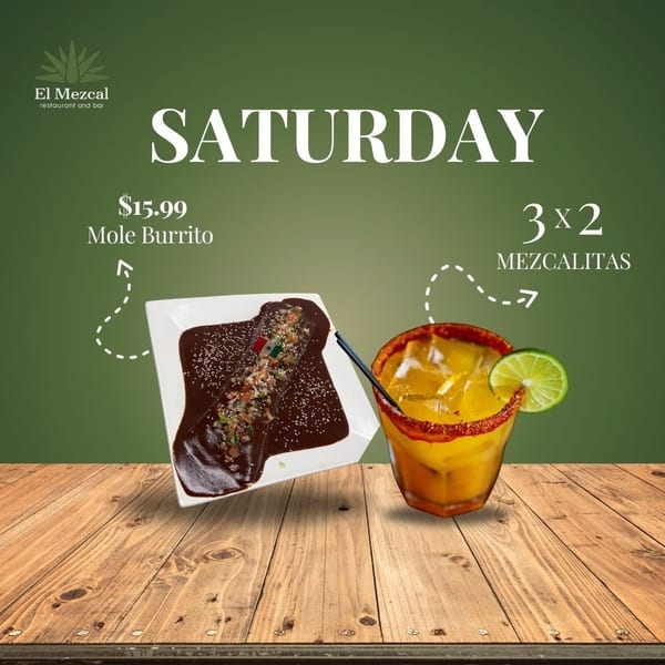 Mole burrito and a Mezcalita cocktail on a wooden table, advertising Saturday specials.